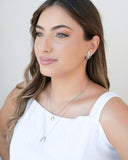 Brinco Meia Argola Oval Liso Ródio Branco