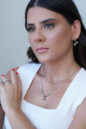 Anel Bolinhas em X Tamanho 16 Ródio Branco