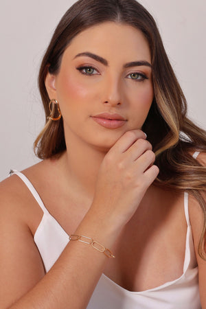 Brinco Orgânico Vazado Liso Banhado a Ouro 18K