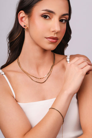 Brinco Ponto de Luz Onix 5 mm Banhado a Ouro 18K