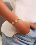 Pulseira Infantil Gravatinha Margaridas Esmaltadas Branca